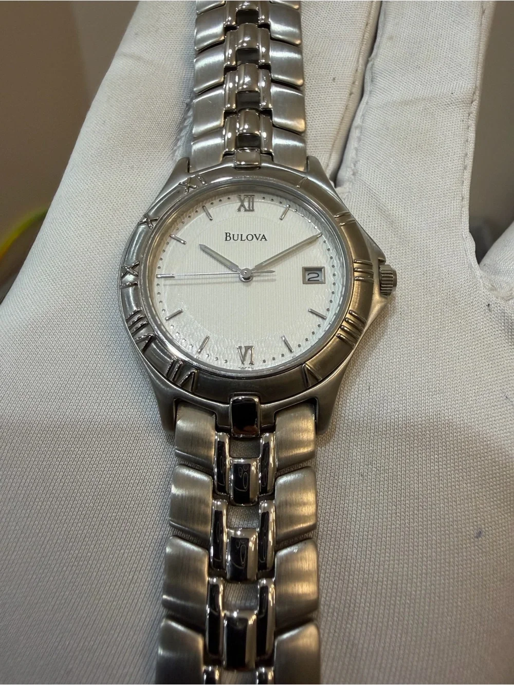 Bulova 96B21 Stainless Steel White Pinstripe Dial Roman Bezel Quartz Watch T9
